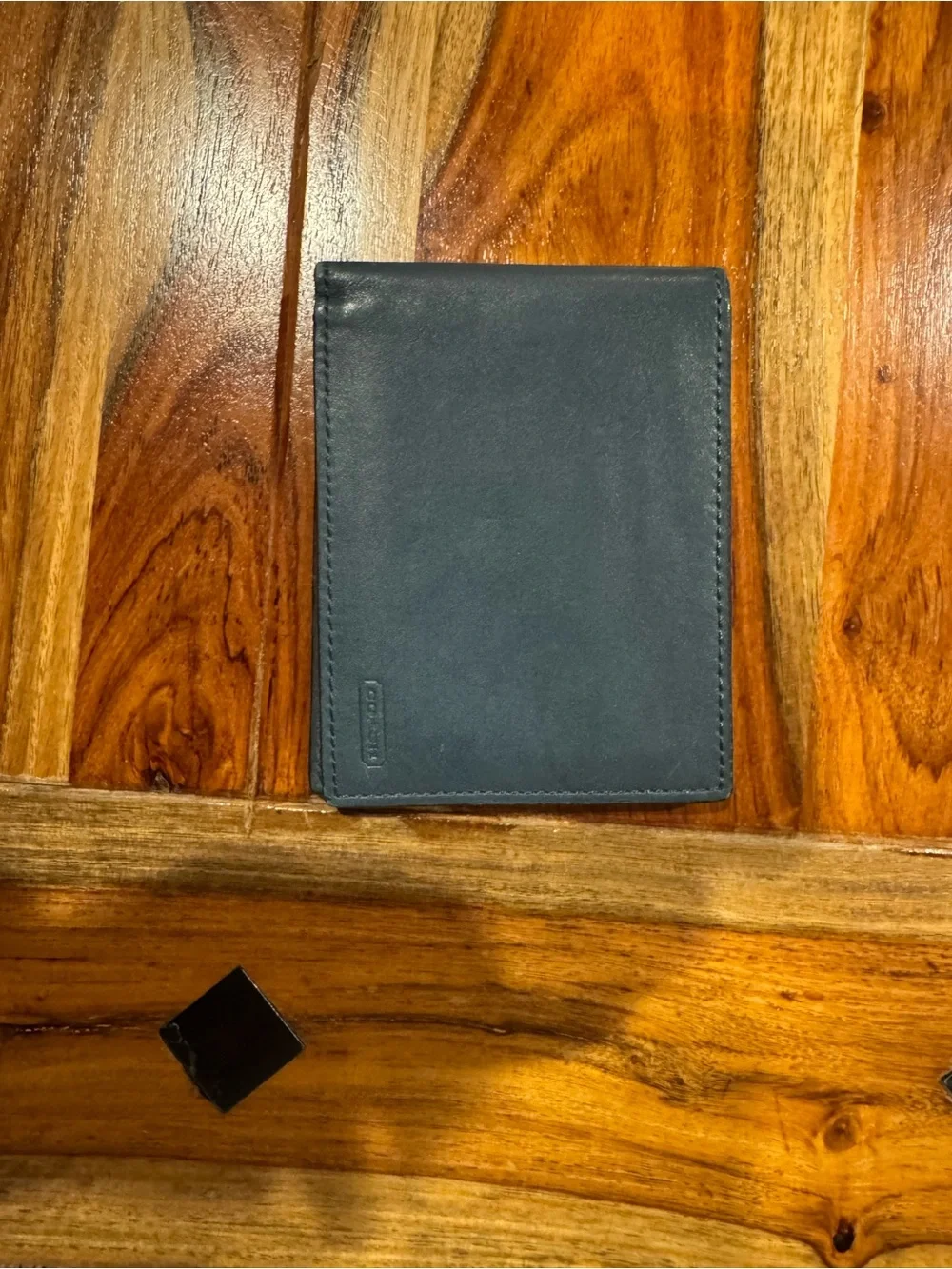 Beautiful blue and brown Coach men’s style leather wallet